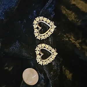 Ladies heart earrings with cz stones in great shape. Very old vintage